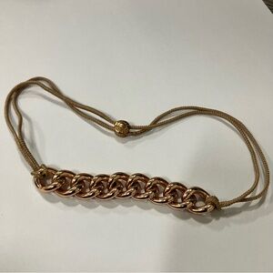HENRI BENDEL CHAINLINK ROSE COLORED GOLD TASSEL BRACELET